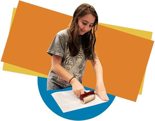 girls making art in front of color blocks